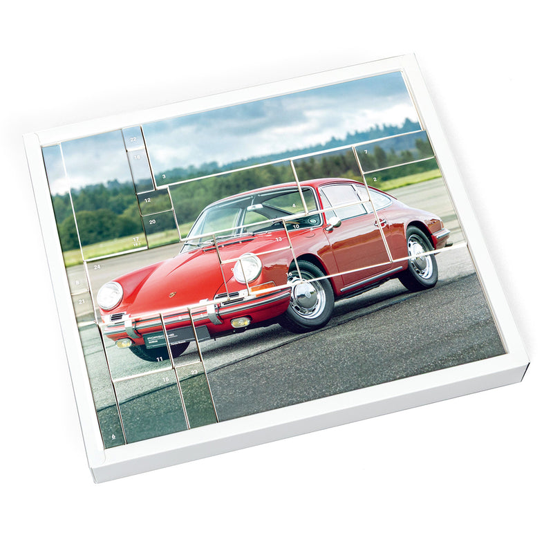 Laden Sie das Bild in Galerie -Viewer, Porsche 911 Adventskalender mit Surfboard
