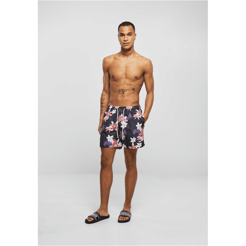 Laden Sie das Bild in Galerie -Viewer, Badeshorts "Tropical Flowers" von Urban Classics Artikelbild 5
