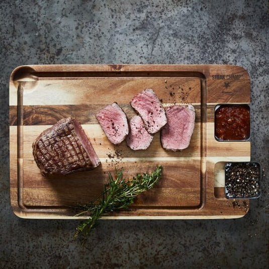 Steakbrett aus Akazienholz mit Edelstahl Sauciere Artikelbild 1